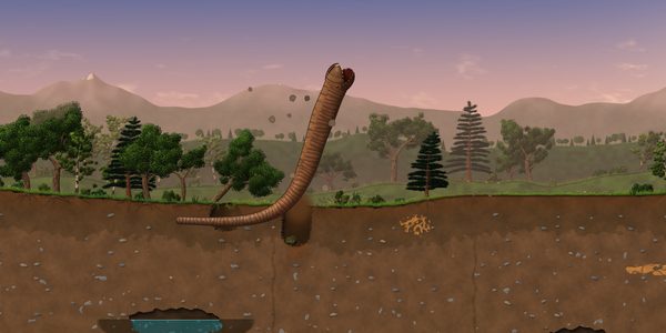 A giant worm bursting out of a meadow at dusk